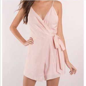 Baby pink romper (never worn)